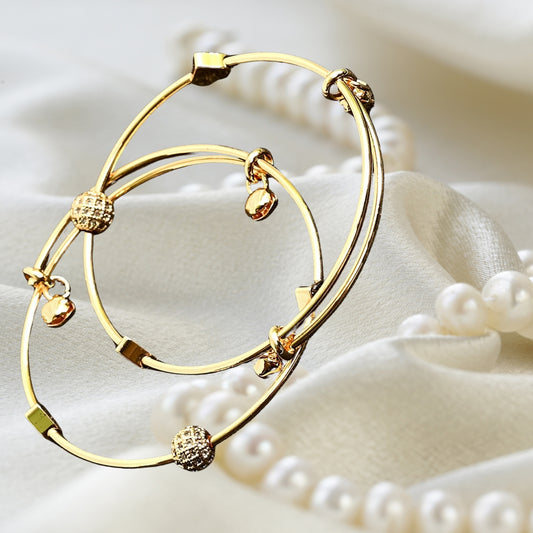 Gold Charm Bangle Set – Stylish & Versatile